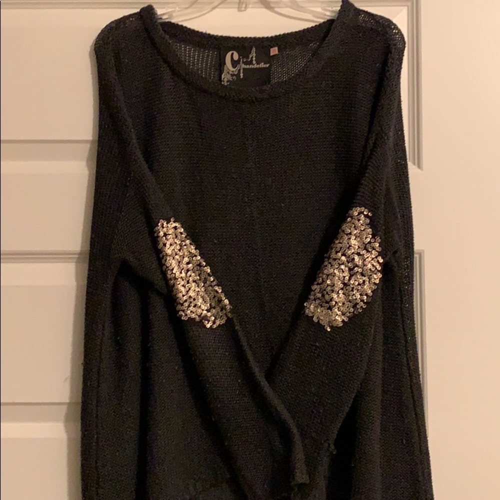 Knit sweater with elbow detail
